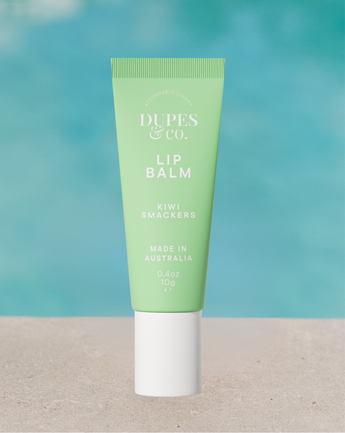 Dupes & Co Kiwi Smacker Lip Balm tube front view