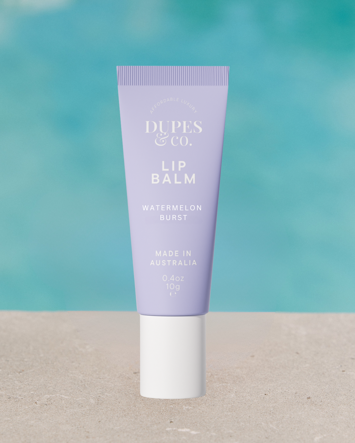 Dupes & Co Watermelon Burst Lip Balm tube front view