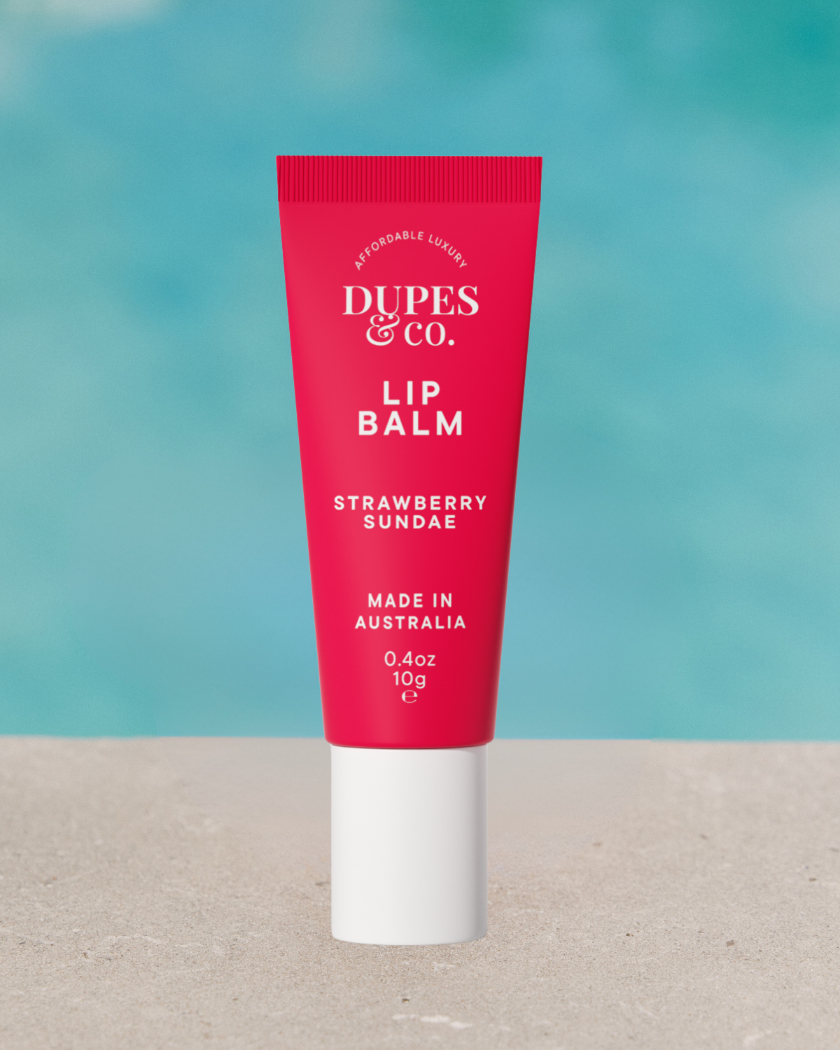 Dupes & Co Strawberry Sundae Lip Balm tube front view