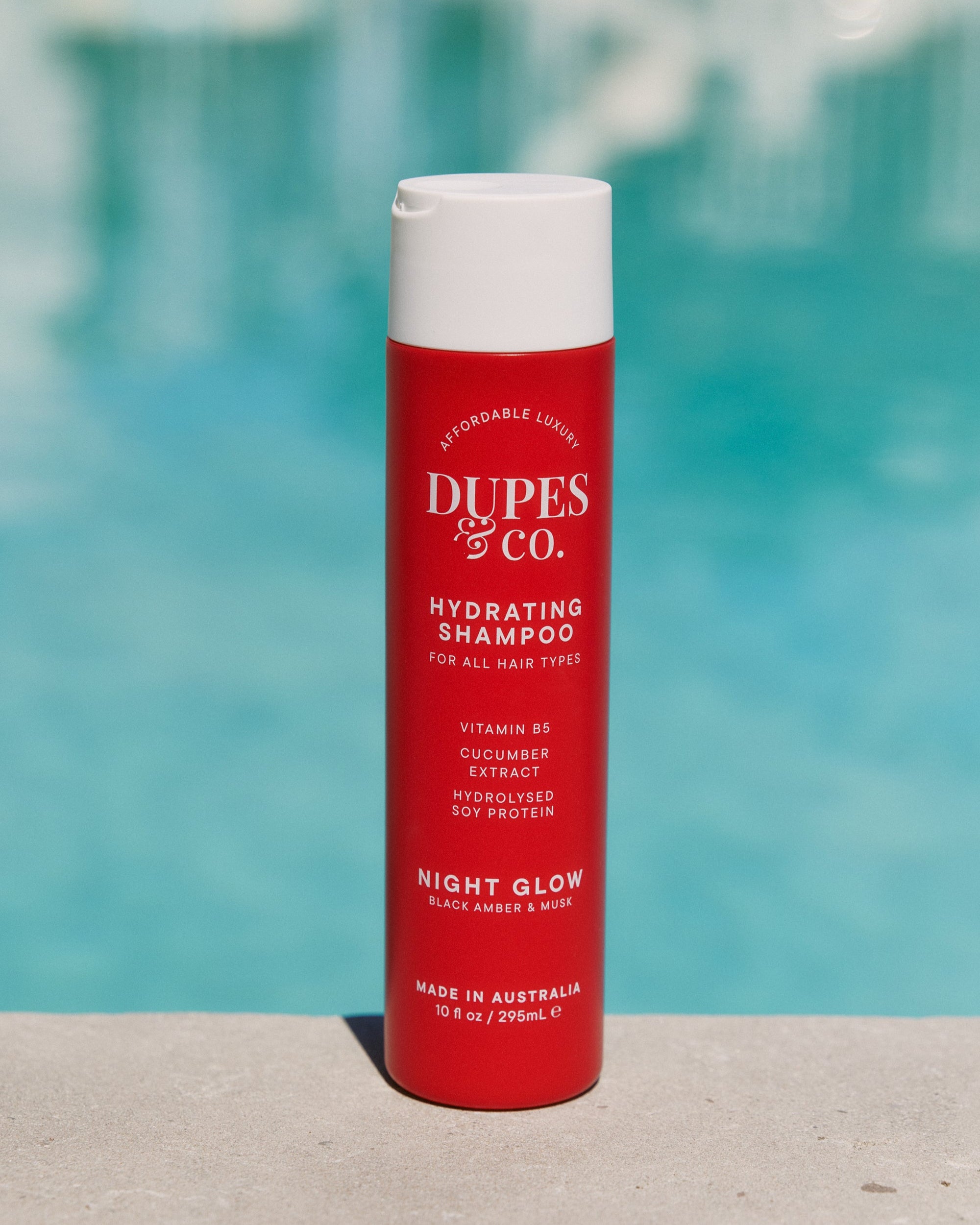 Dupes & Co Night Glow 10 fl oz Shampoo bottle front view