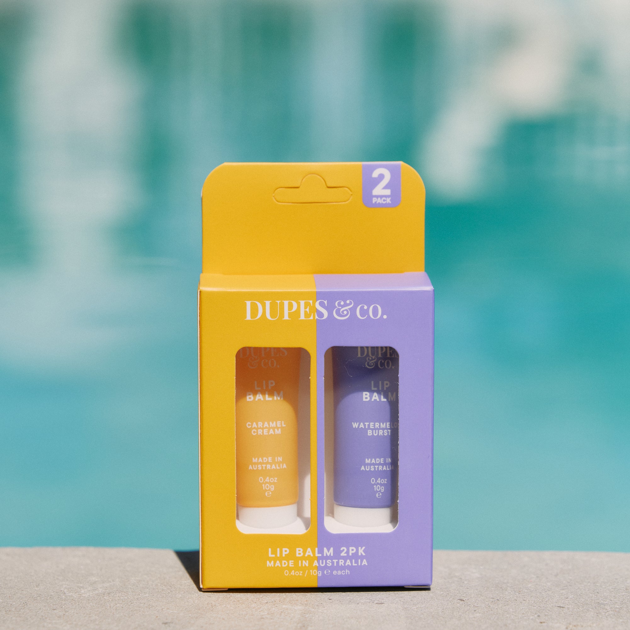Dupes & Co Caramel Cream and Watermelon Burst Lip Balm 2-pack front view